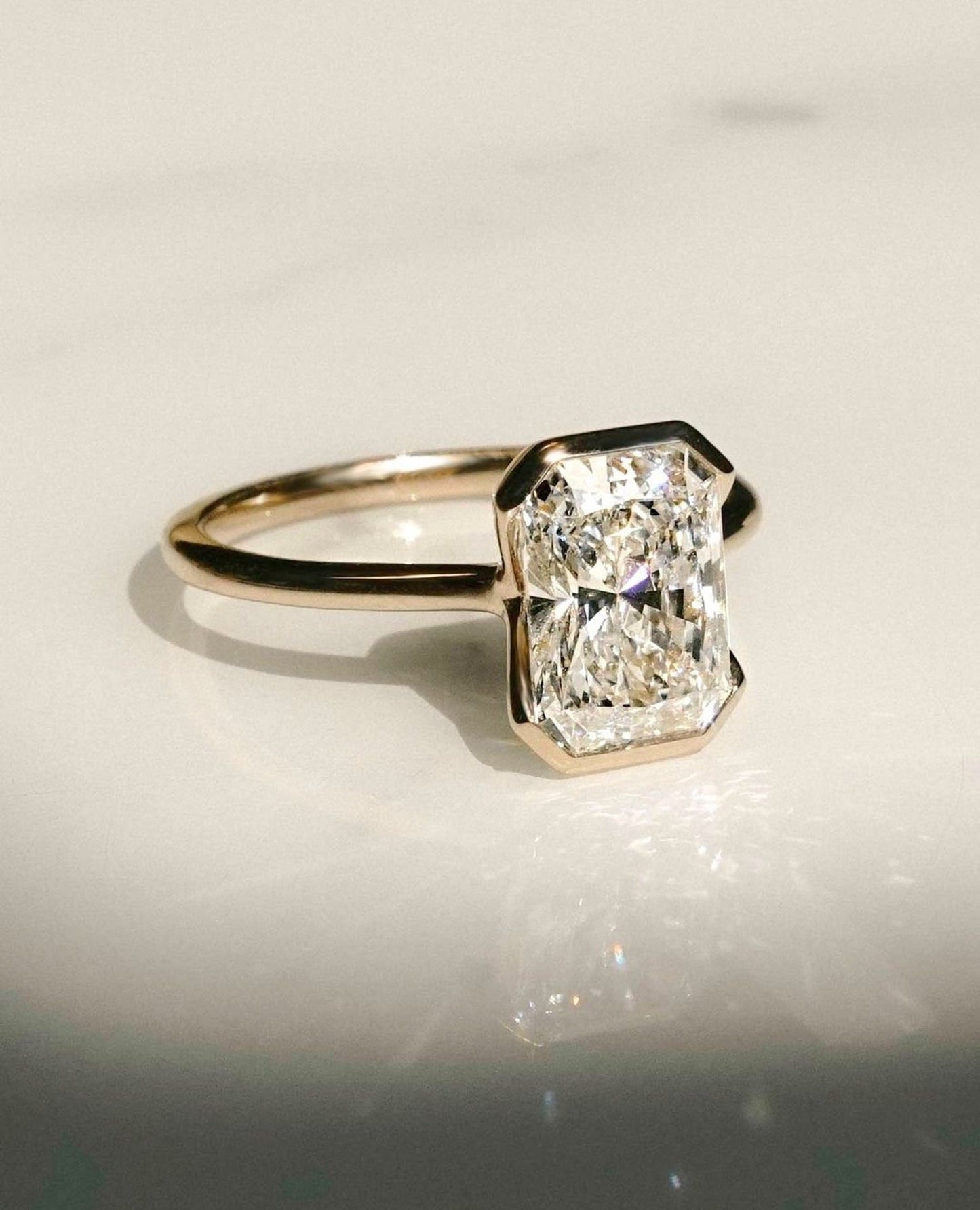 Half Bezel Ring with 1.50 CT Radiant Cut Moissanite