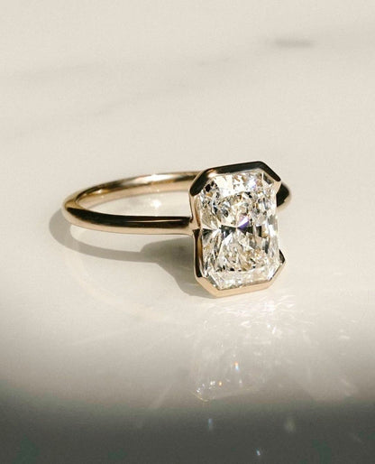 Half Bezel Ring with 1.50 CT Radiant Cut Moissanite