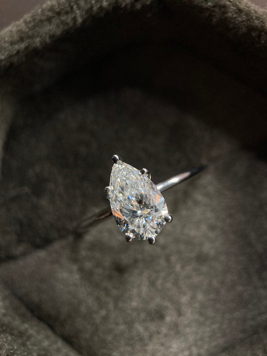Solitaire Ring with 2.0 CT Pear Cut Moissanite