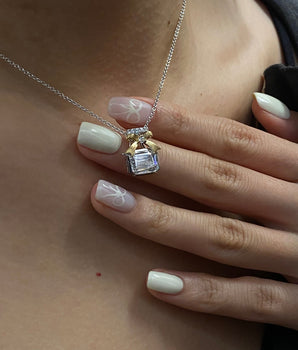 Bow Necklace with 2.0 TCW Emerald Cut Moissanite