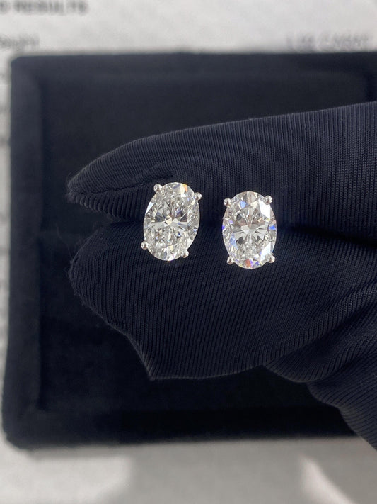 Solitaire Stud Earrings with 2.0 TCW Oval Cut Moissanite