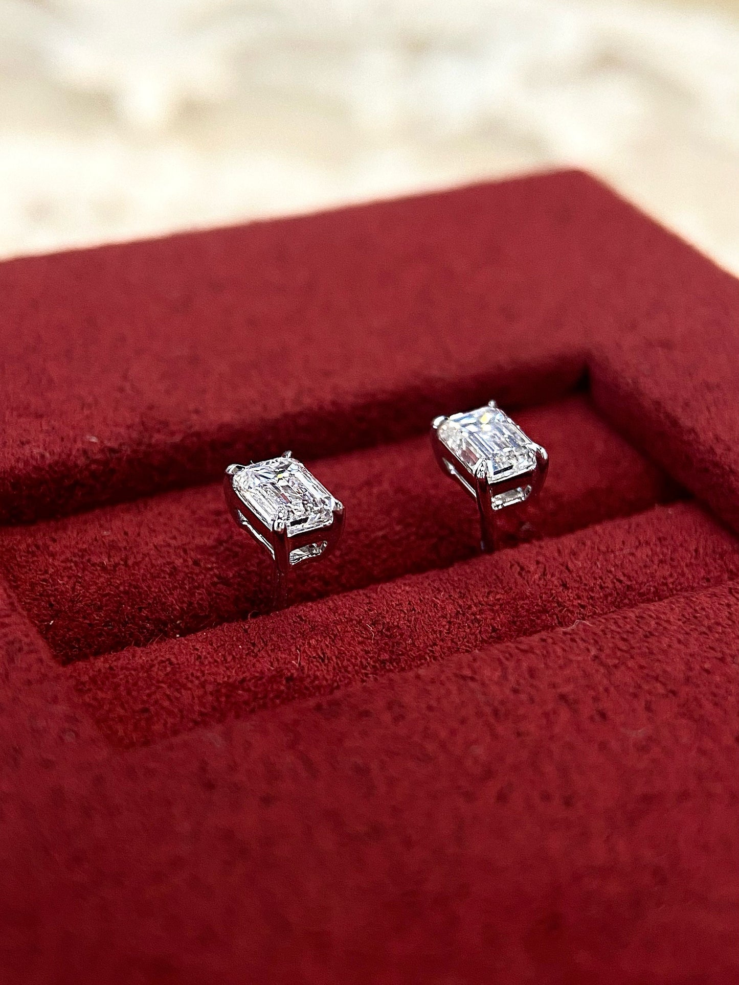 Solitaire Stud Earrings with 0.60 TCW Emerald Cut Moissanite