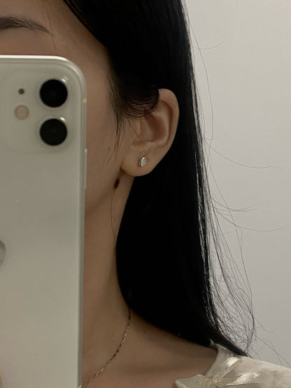 Solitaire Stud Earrings with 0.60 TCW Marquise Cut Moissanite