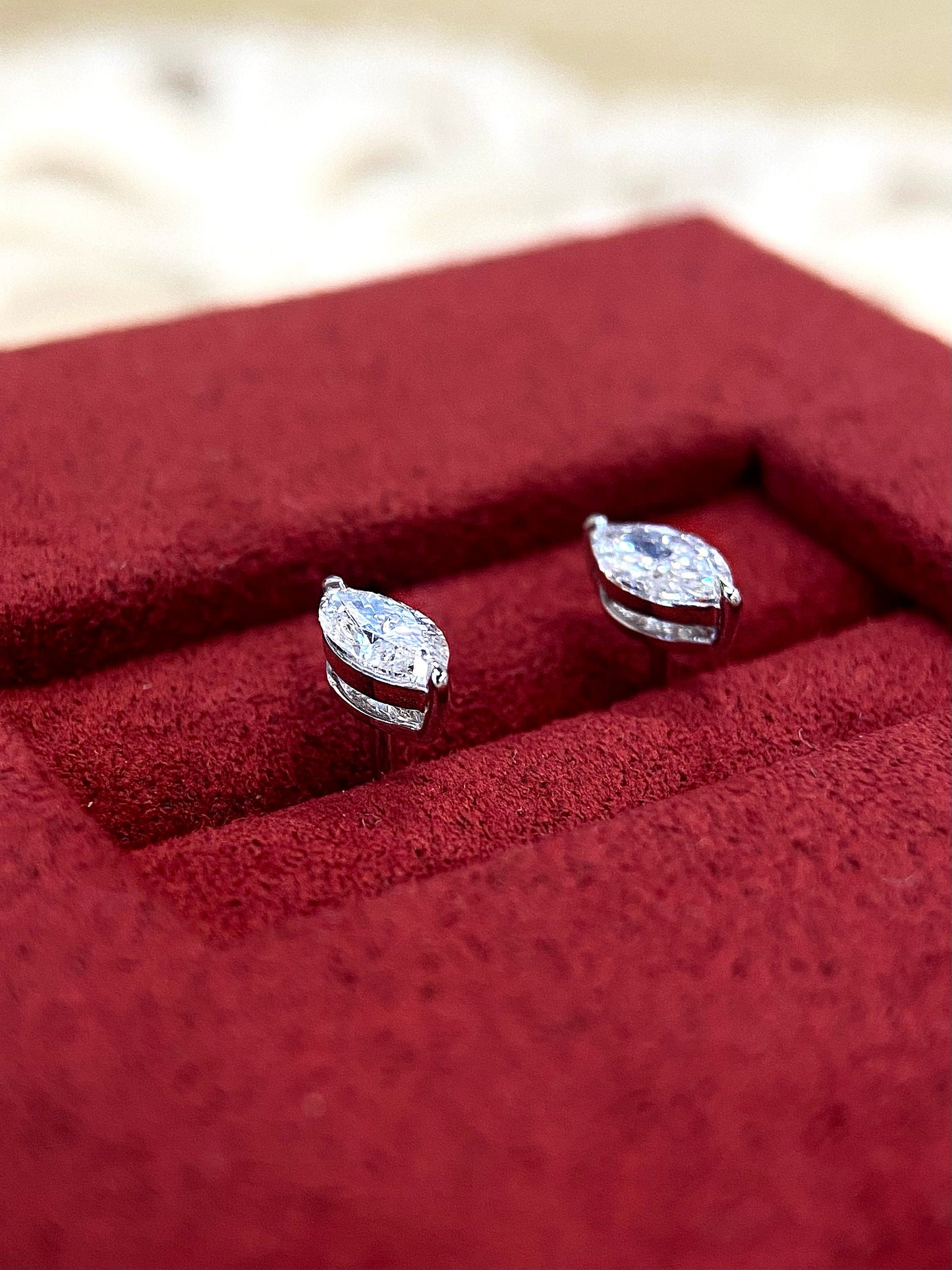 Solitaire Stud Earrings with 0.60 TCW Marquise Cut Moissanite