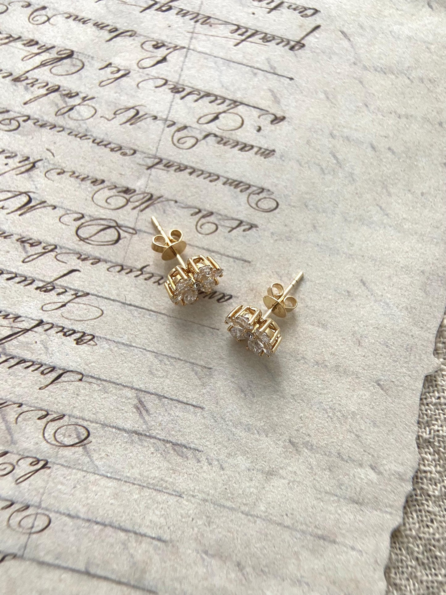 Flower Stud Earrings with 1.28 TCW Pear & Round Cut Moissanite