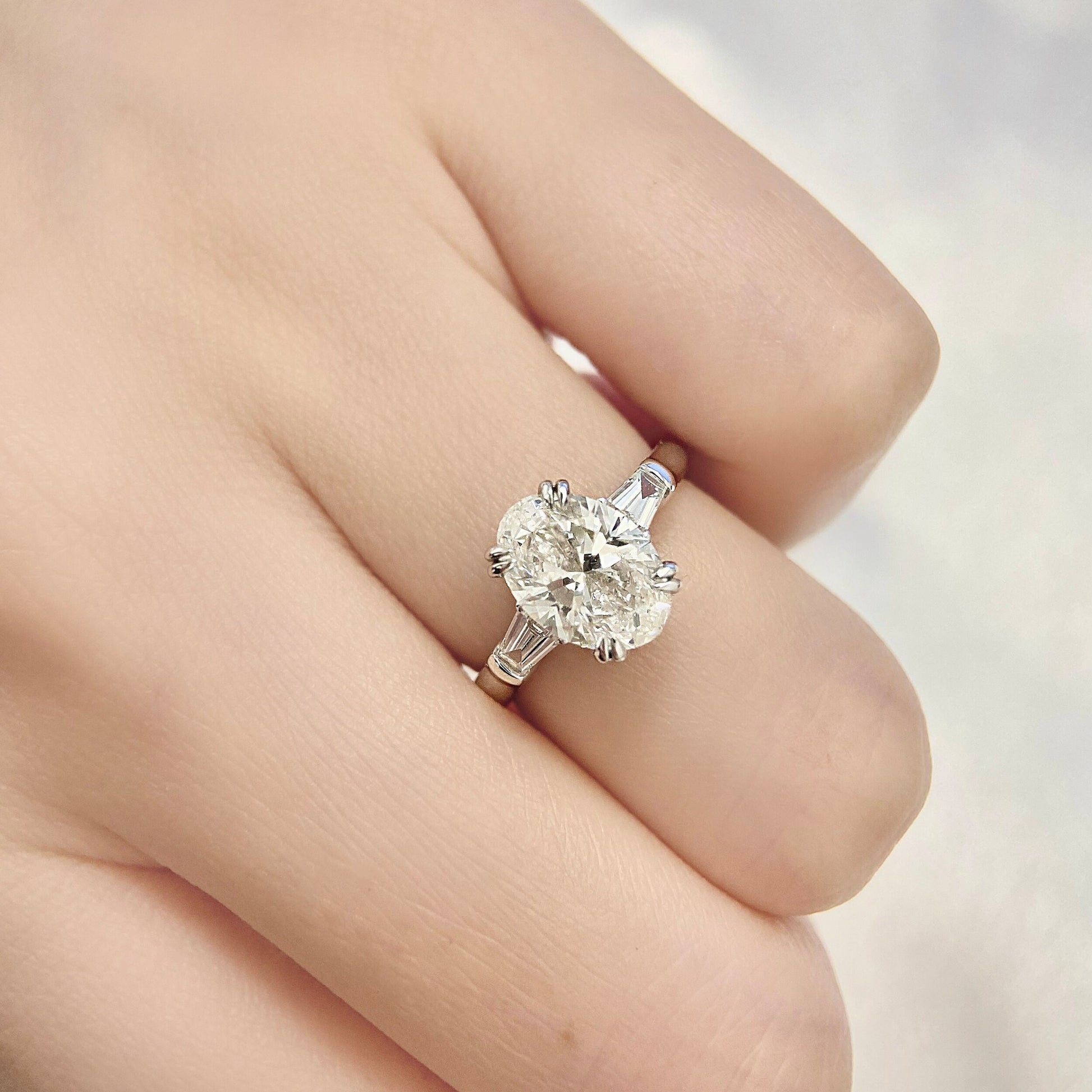 Oval cut CVD diamond three stone style engagement ring