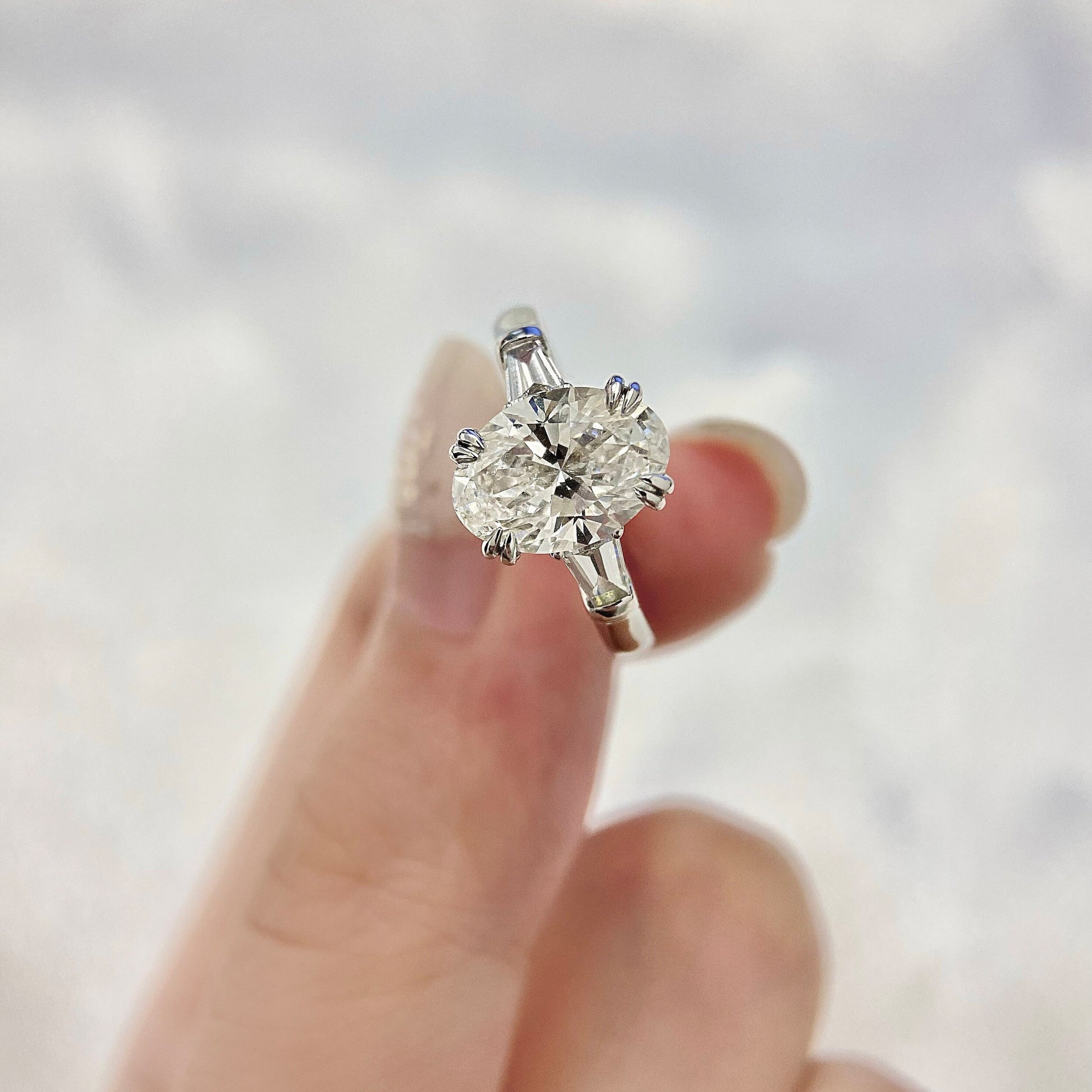Oval cut CVD diamond three stone style engagement ring