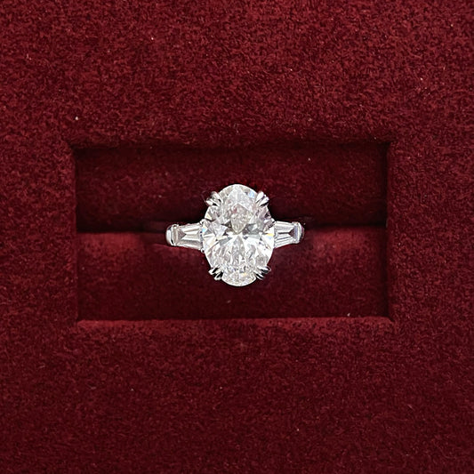 Oval cut CVD diamond three stone style engagement ring