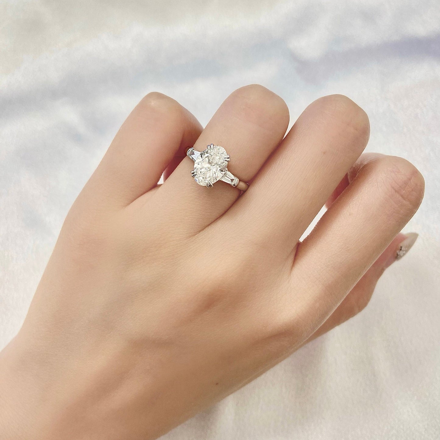 Oval cut CVD diamond three stone style engagement ring