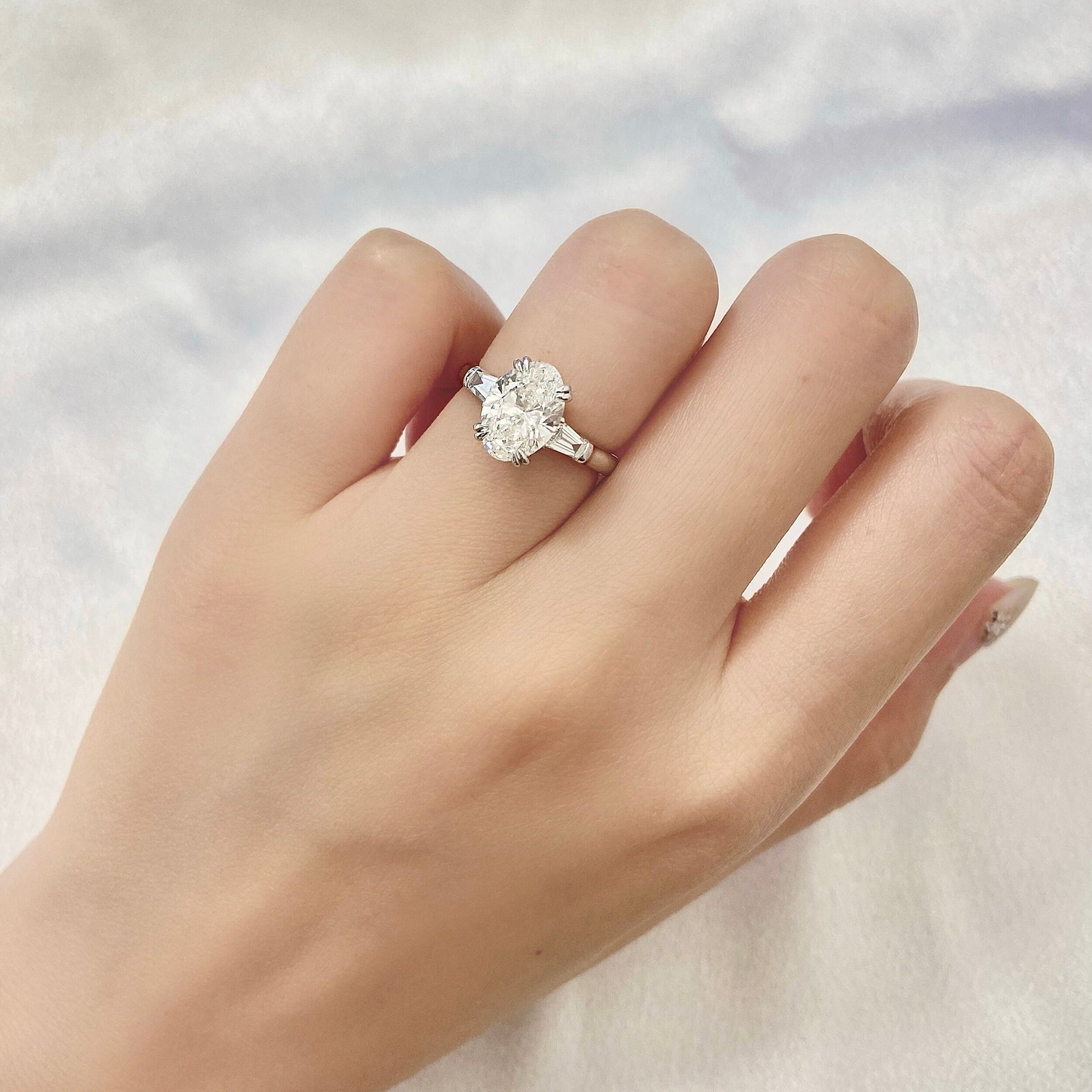 Oval cut CVD diamond three stone style engagement ring
