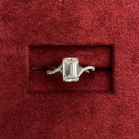Emerald cut CVD diamond twisted style engagement ring