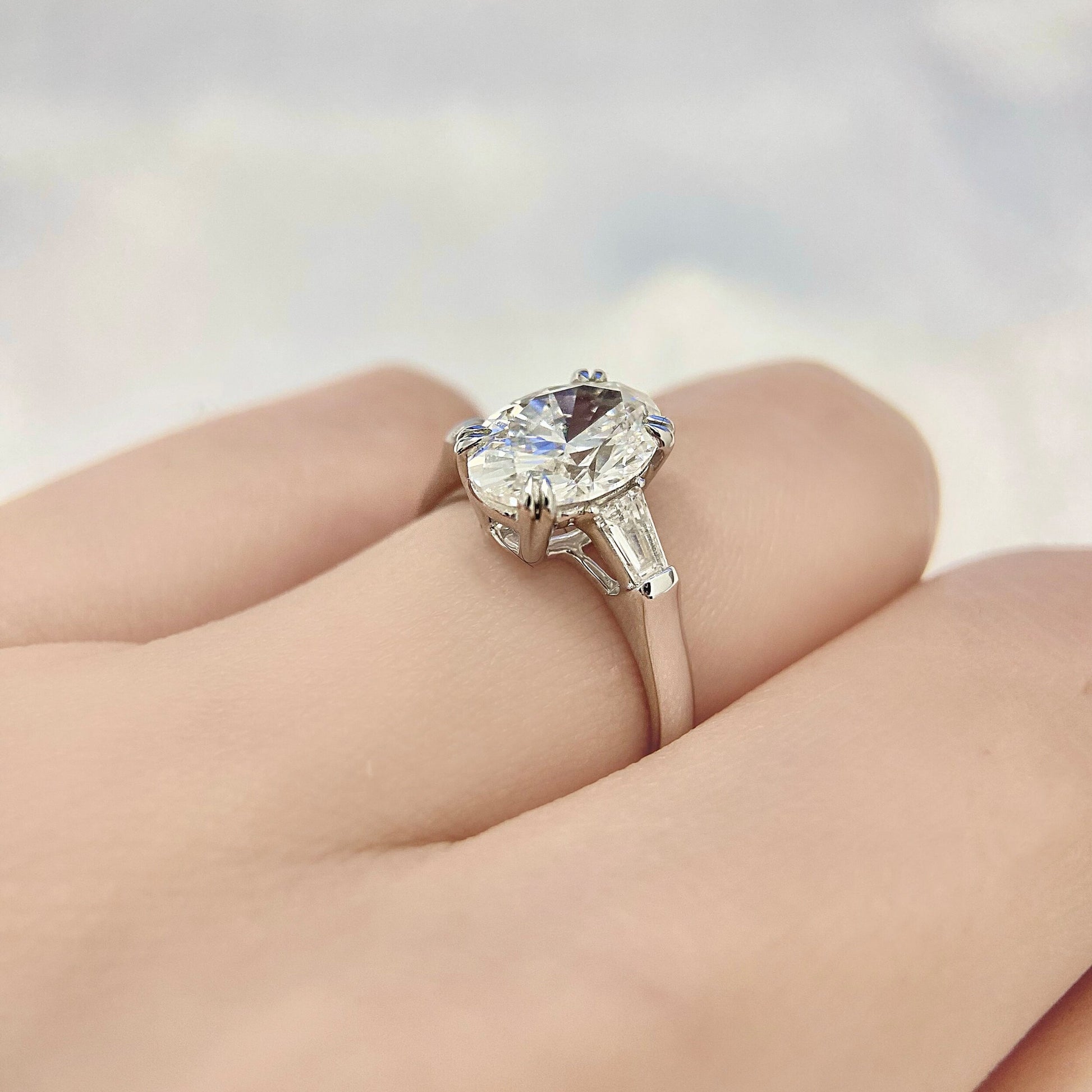 Oval cut CVD diamond three stone style engagement ring