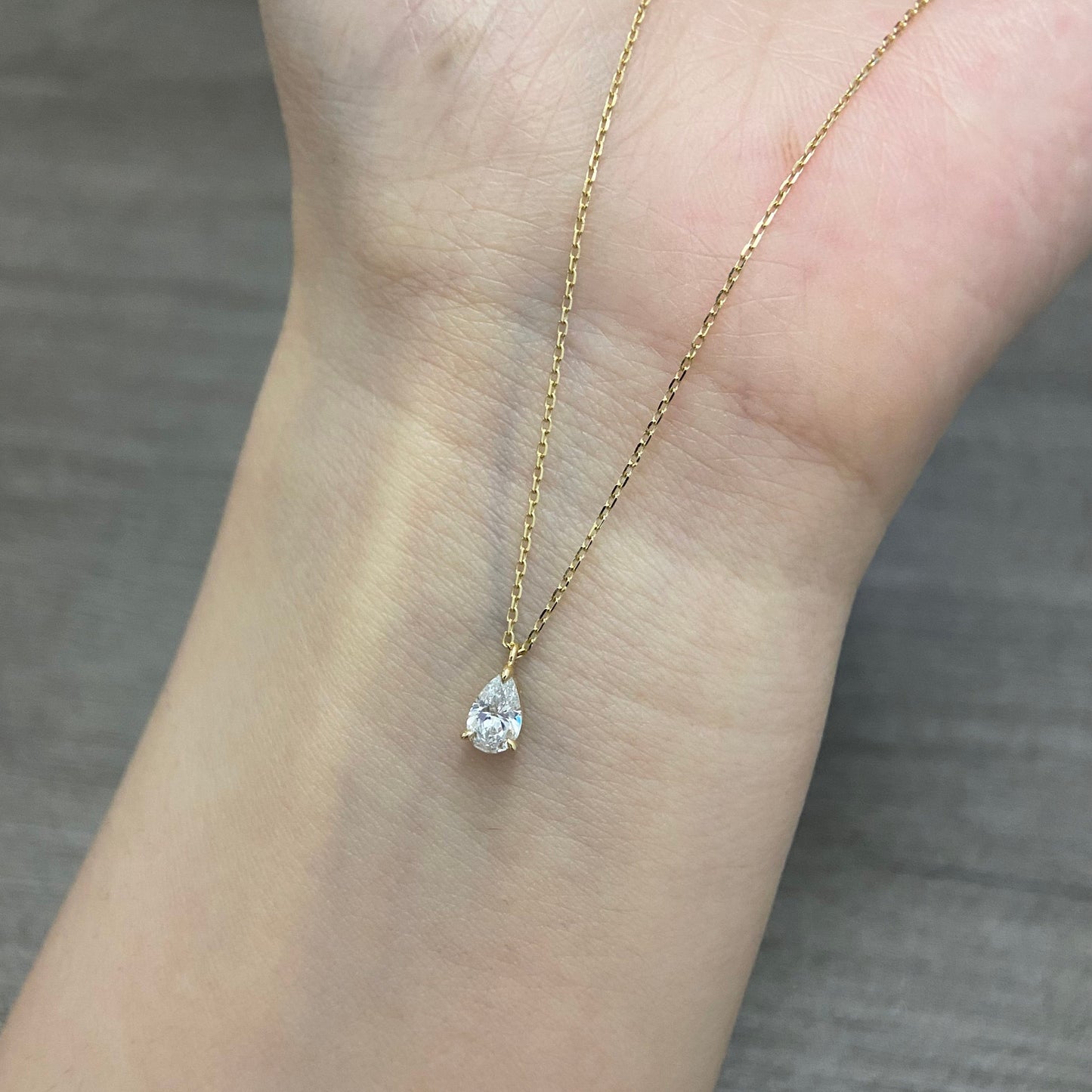 Solitaire Necklace with 0.30 TCW Pear Cut Moissanite