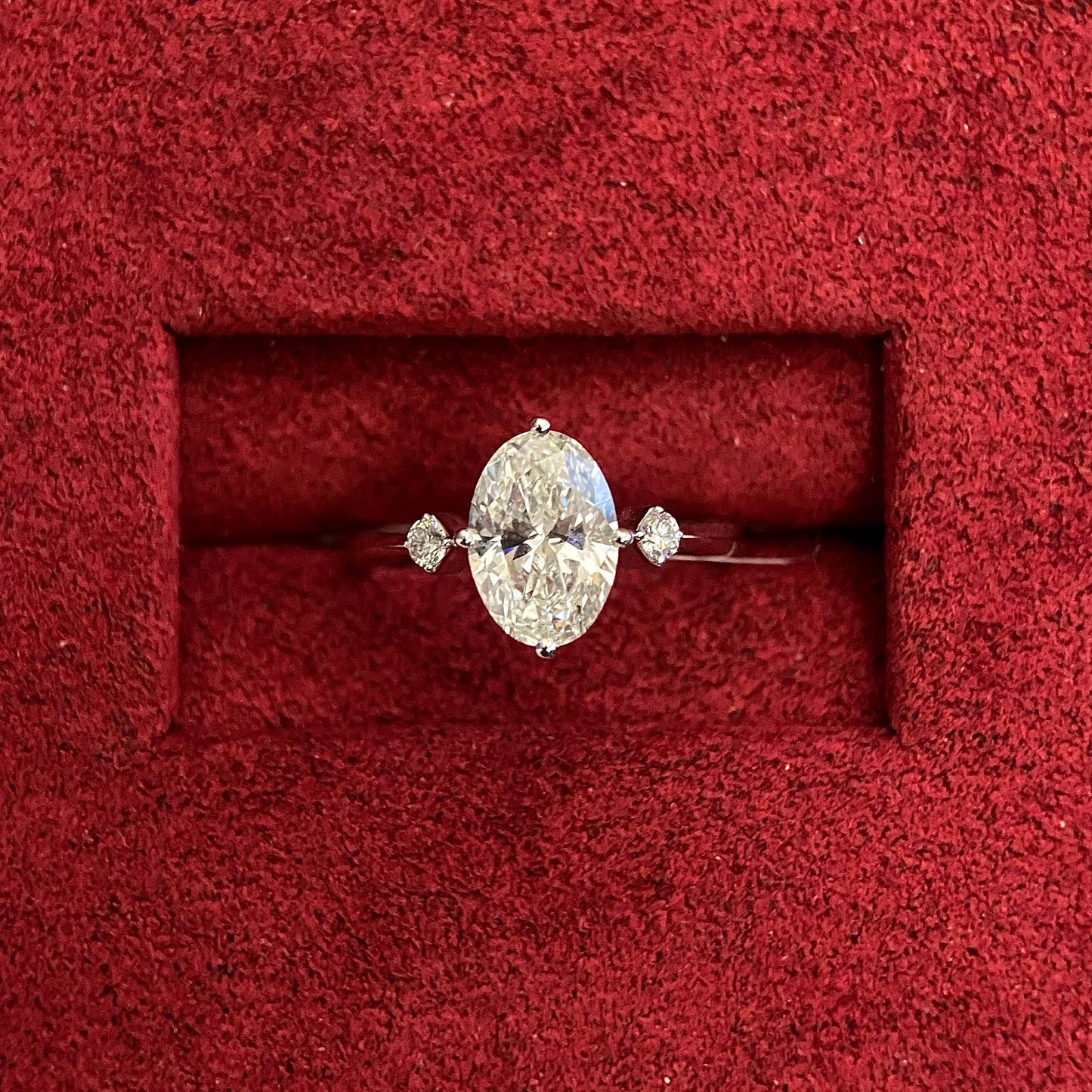 Oval cut CVD diamond three stone style engagement ring