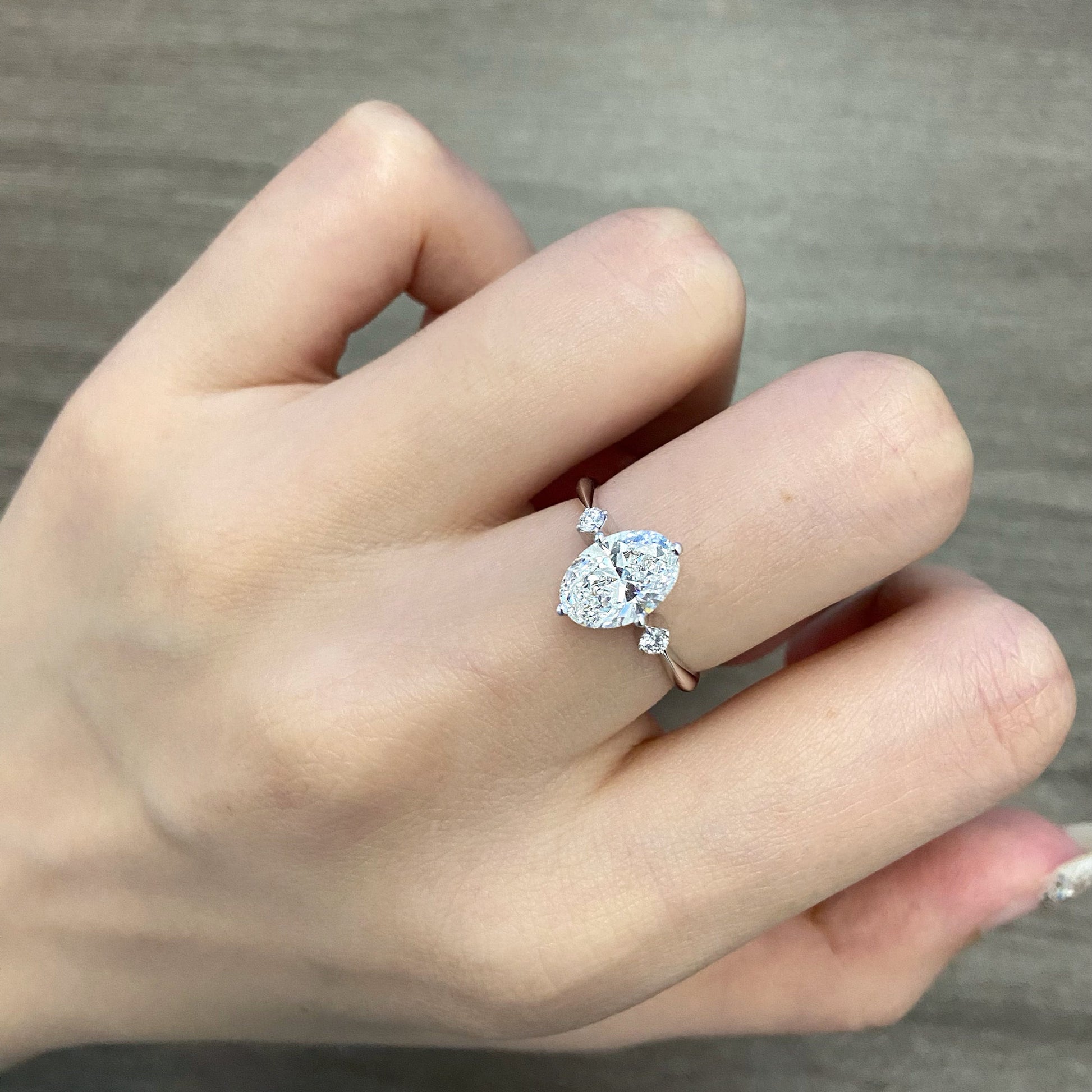Oval cut CVD diamond three stone style engagement ring