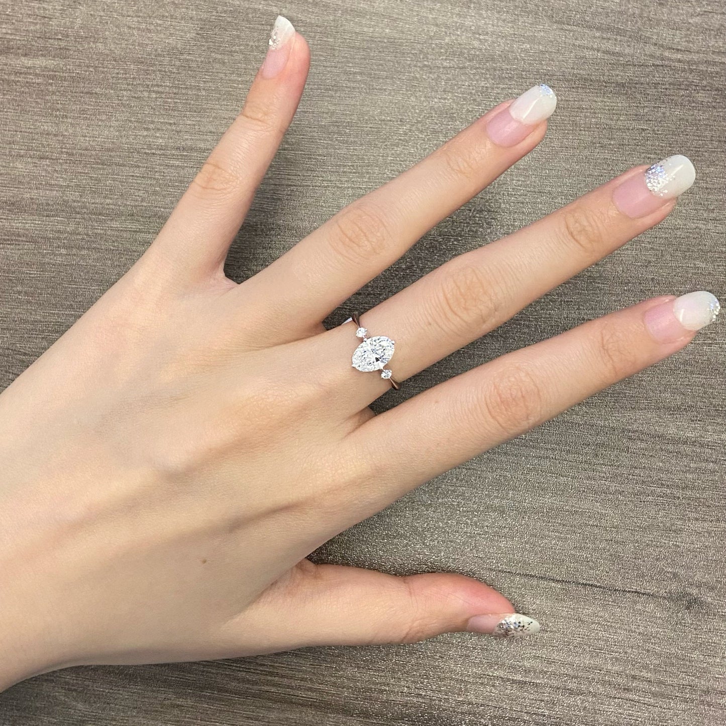 Oval cut CVD diamond three stone style engagement ring