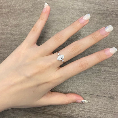 Oval cut CVD diamond three stone style engagement ring