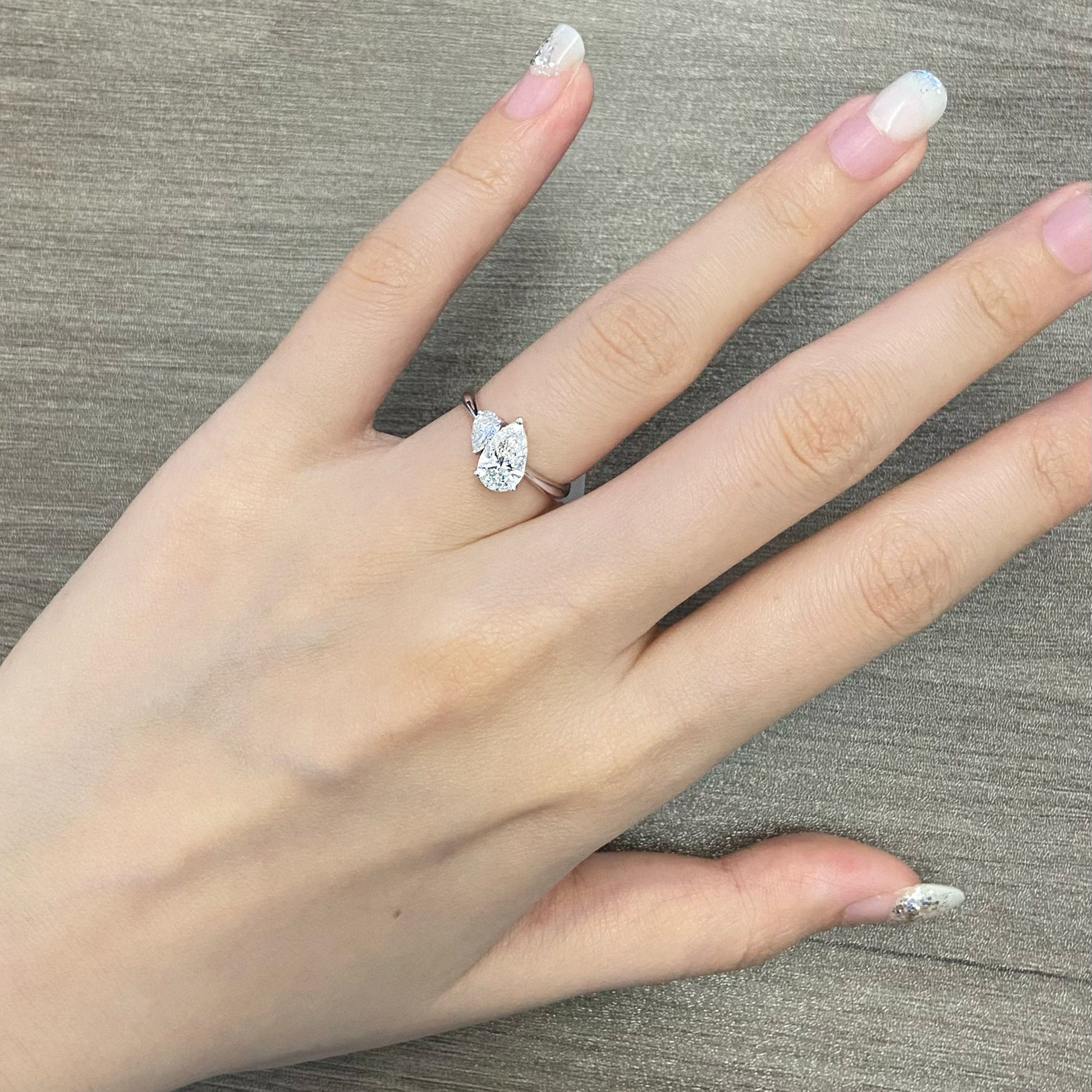 Pear cut CVD diamond two stone style engagement ring