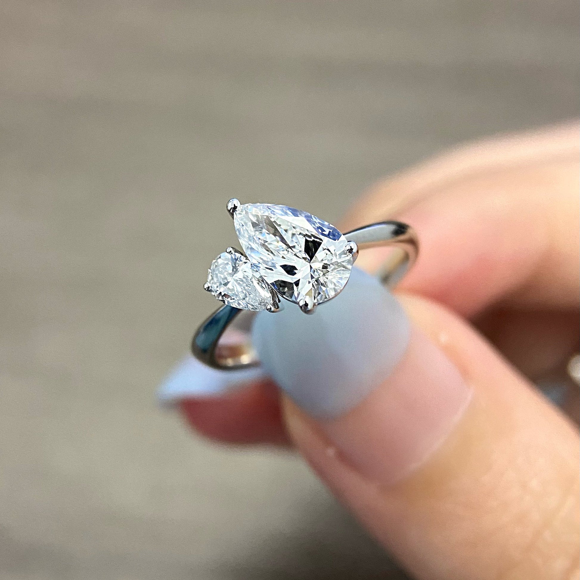Pear cut CVD diamond two stone style engagement ring