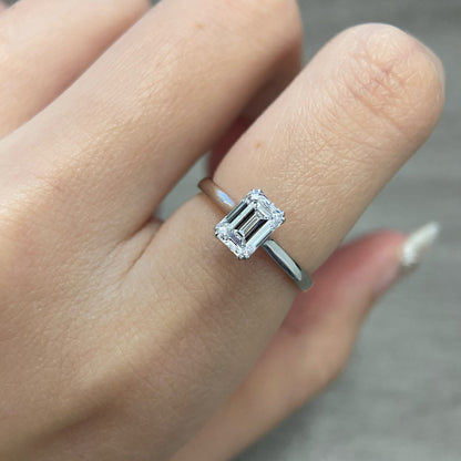 Emerald cut CVD diamond solitaire style engagement ring