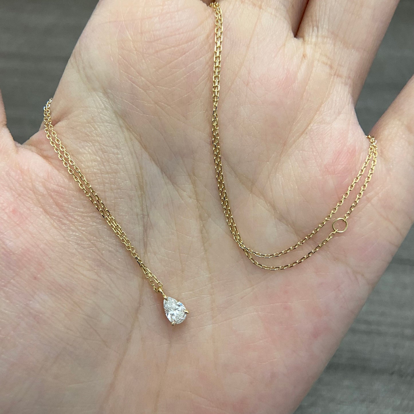 Solitaire Necklace with 0.30 TCW Pear Cut Moissanite