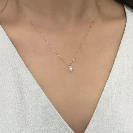 Solitaire Necklace with 0.30 TCW Pear Cut Moissanite