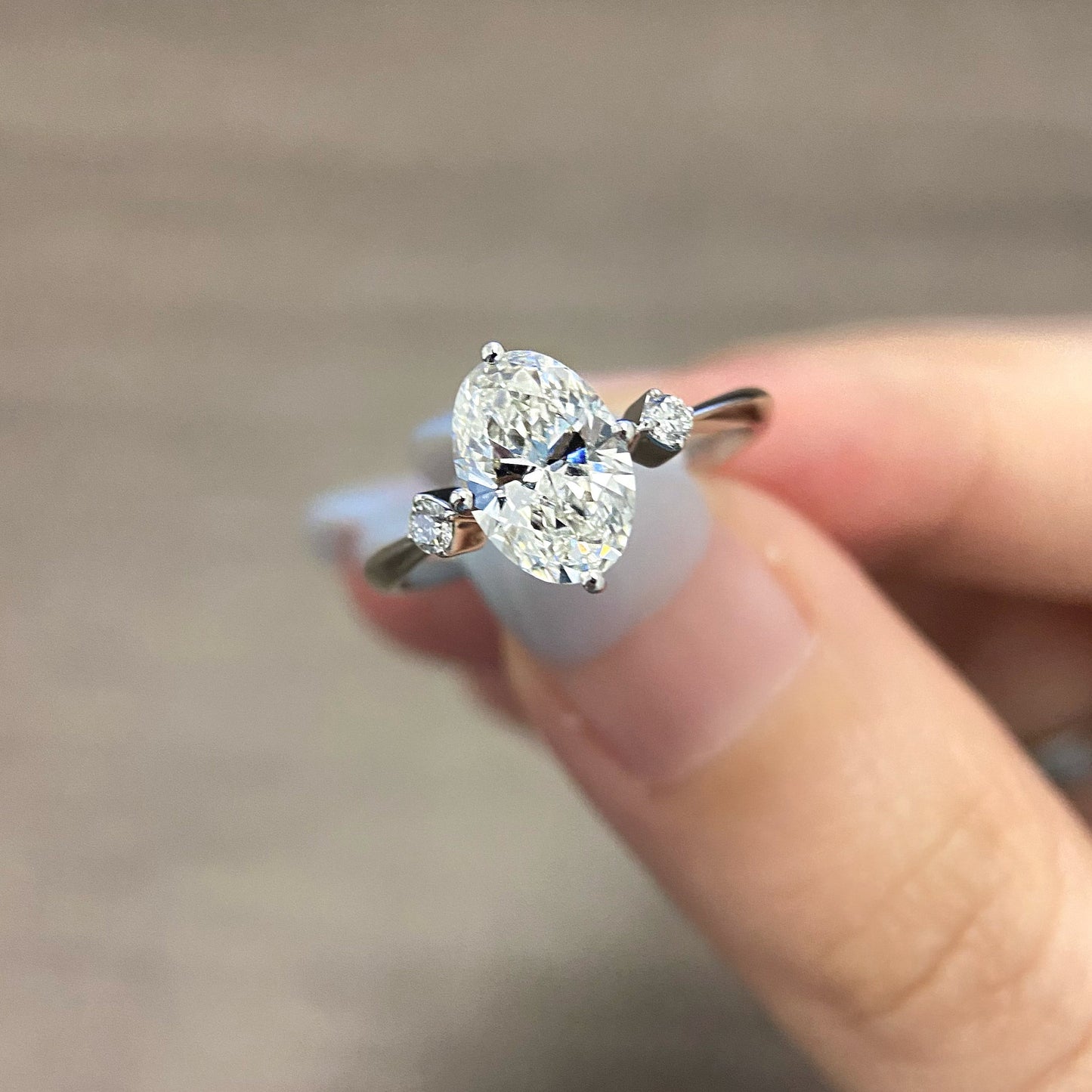 Oval cut CVD diamond three stone style engagement ring