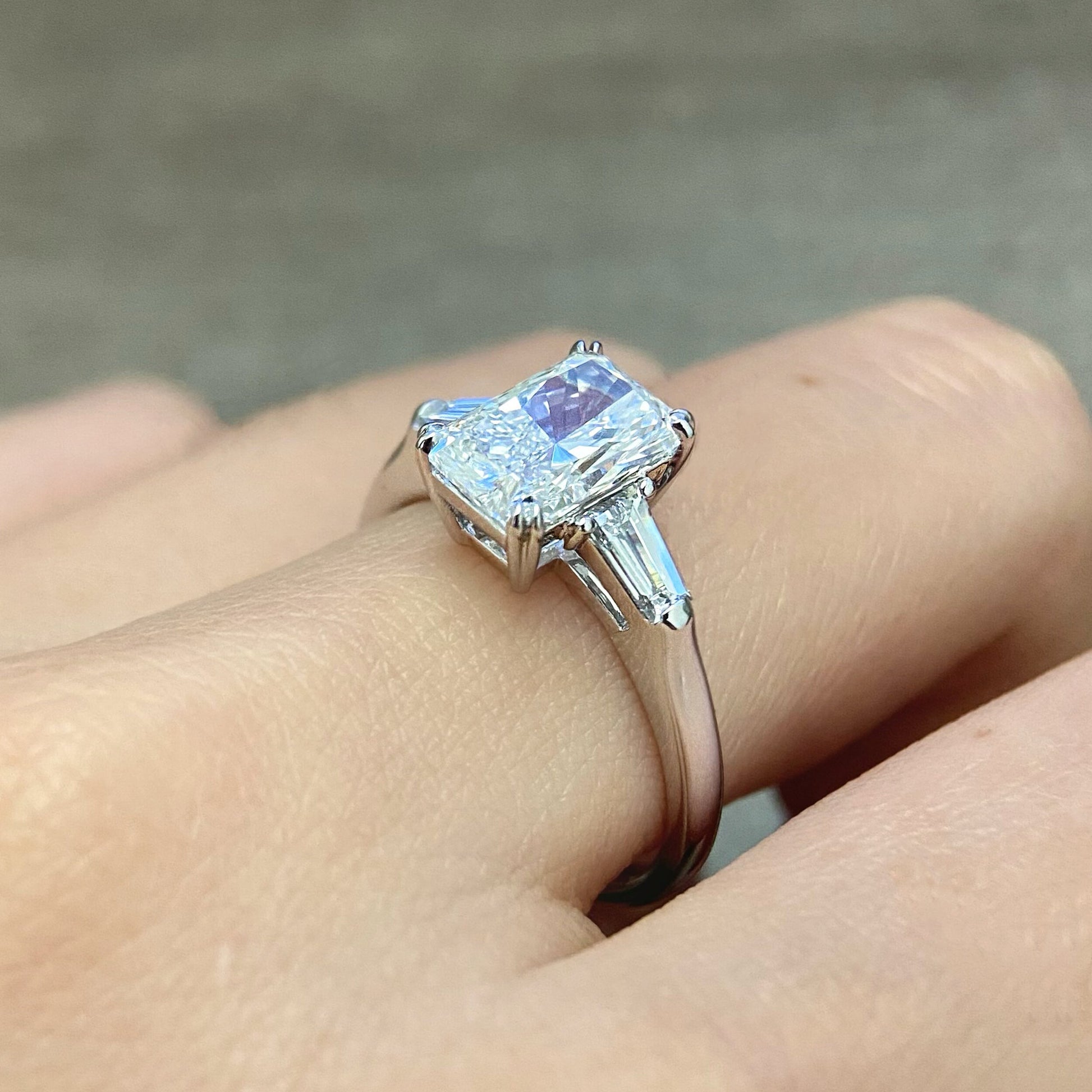 Radiant cut CVD diamond three stone engagement ring