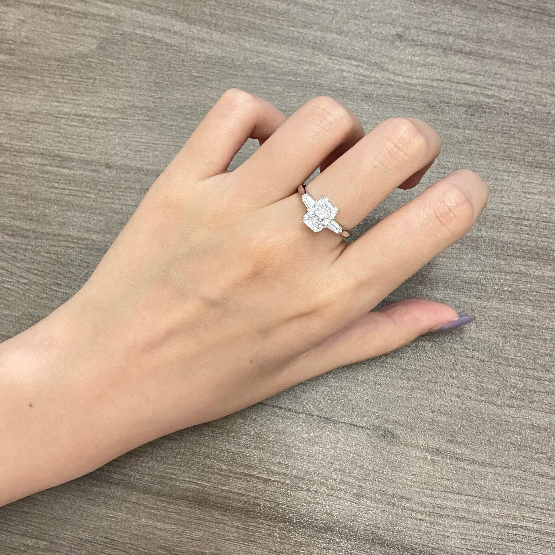 Radiant cut CVD diamond three stone engagement ring