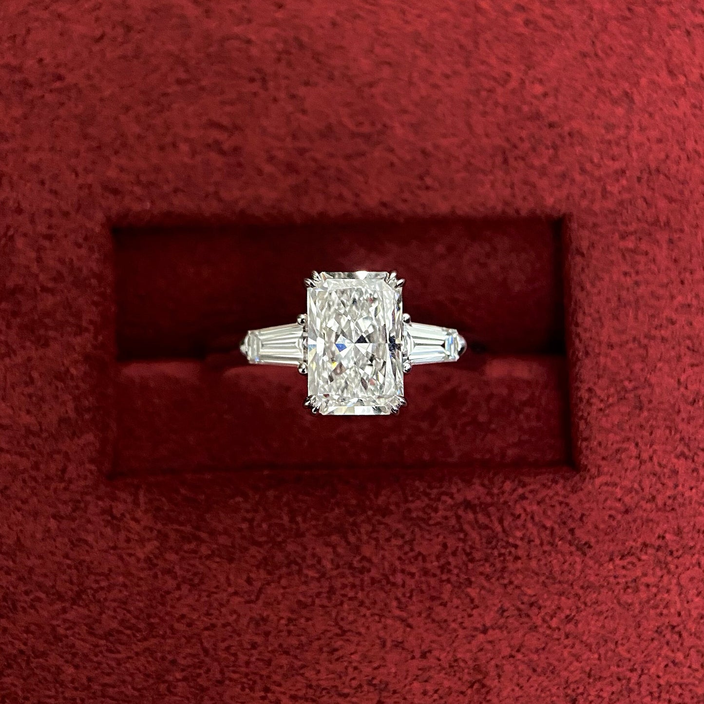 Radiant cut CVD diamond three stone engagement ring