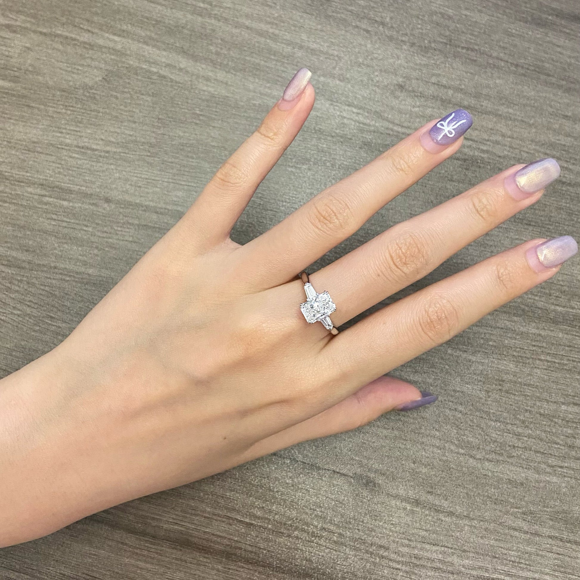 Radiant cut CVD diamond three stone engagement ring