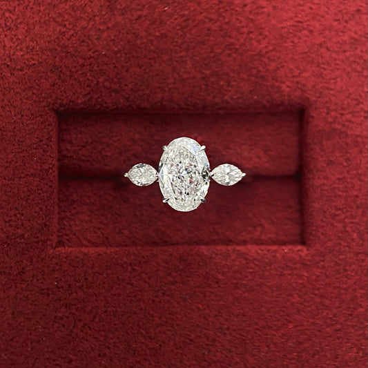 Oval cut CVD diamond three stone style engagement ring