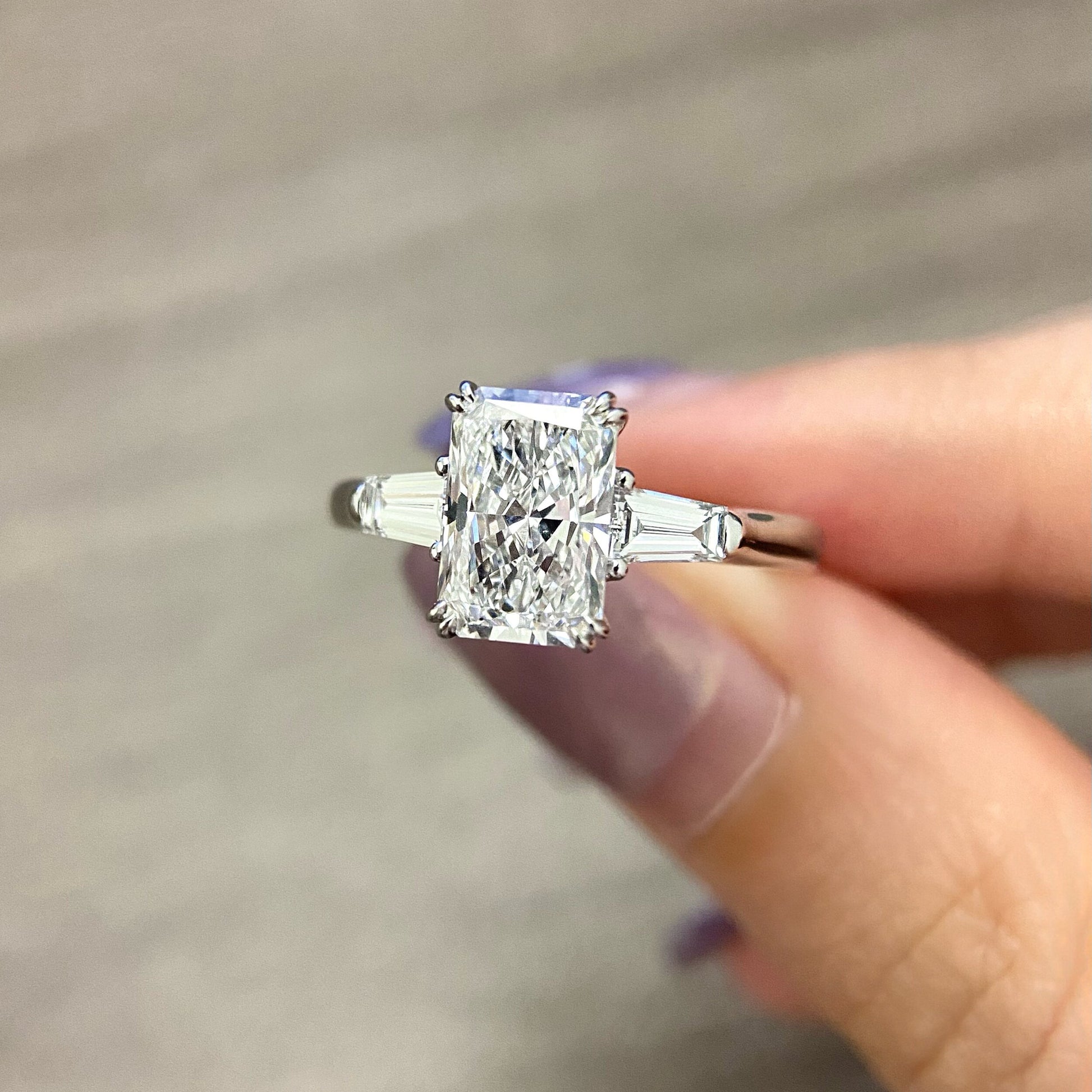 Radiant cut CVD diamond three stone engagement ring