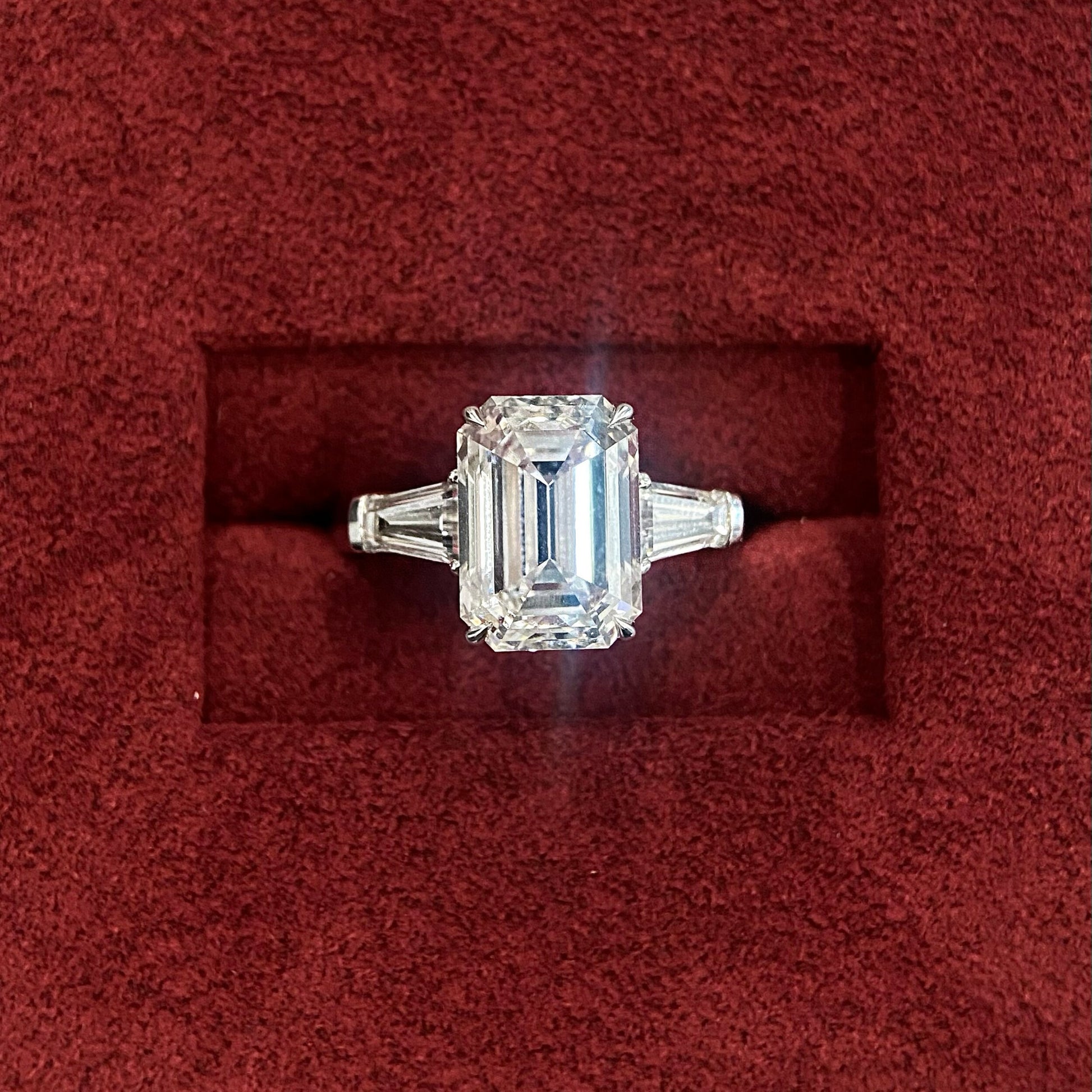 Emerald cut CVD diamond three stone setting engagement ring