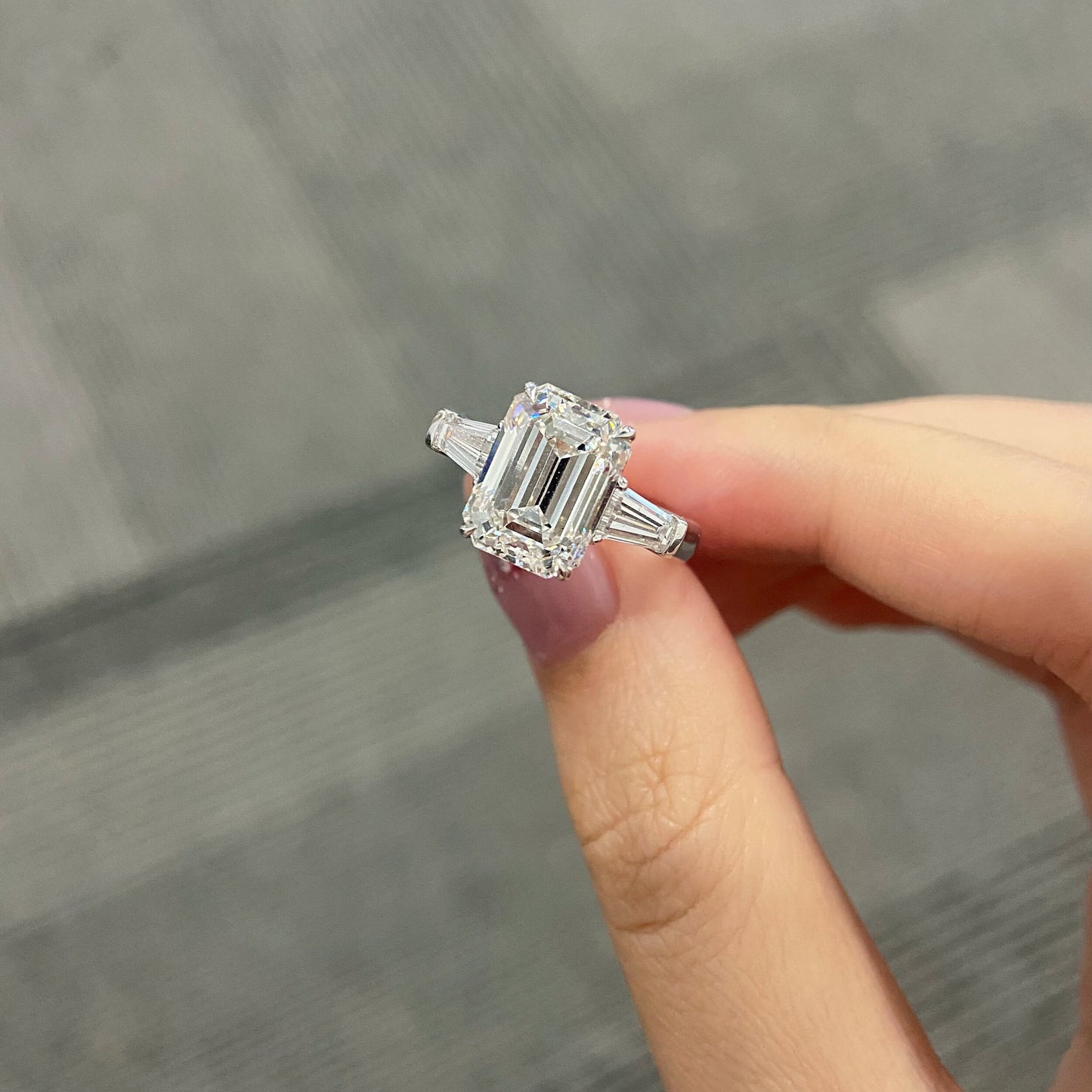 Emerald cut CVD diamond three stone setting engagement ring