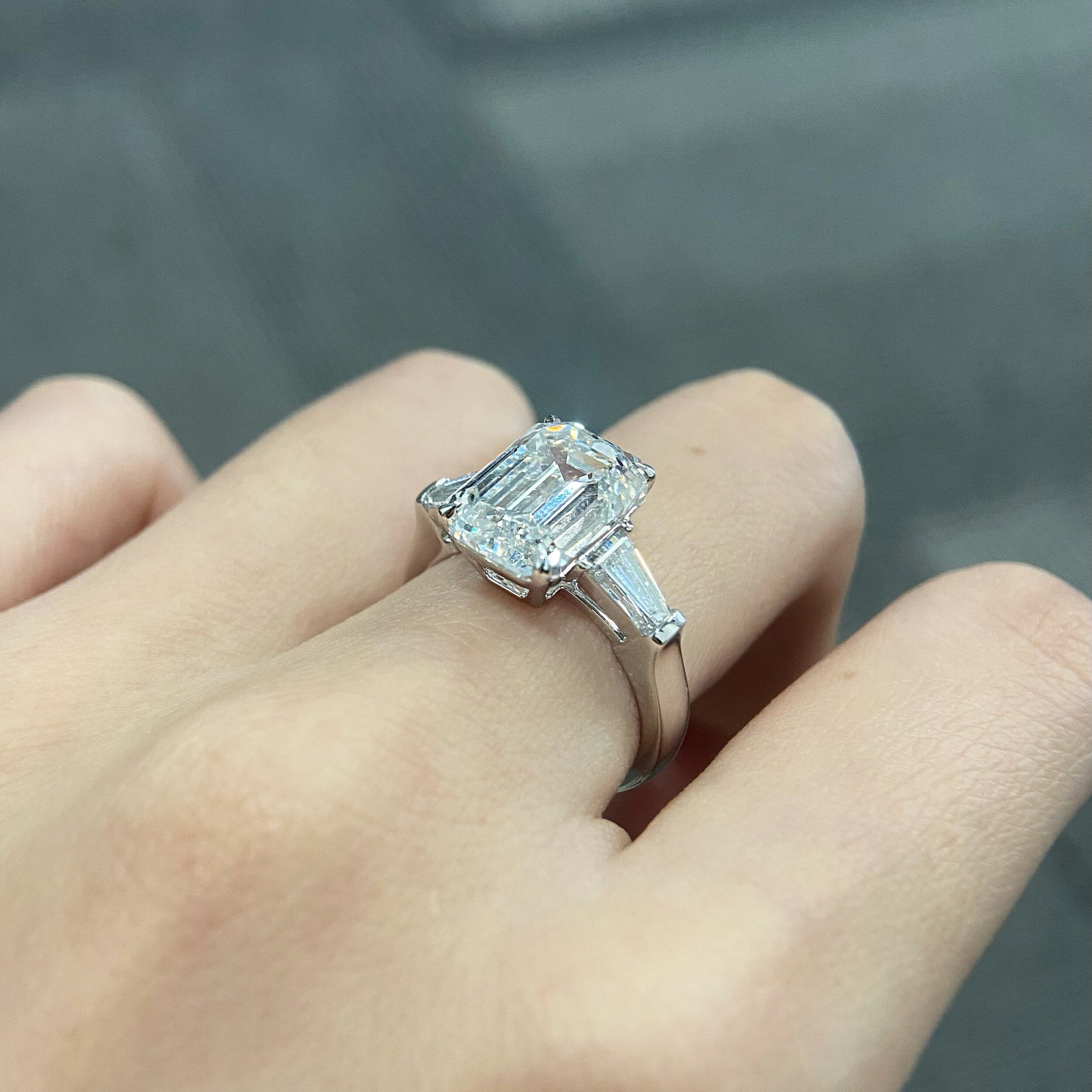 Emerald cut CVD diamond three stone setting engagement ring