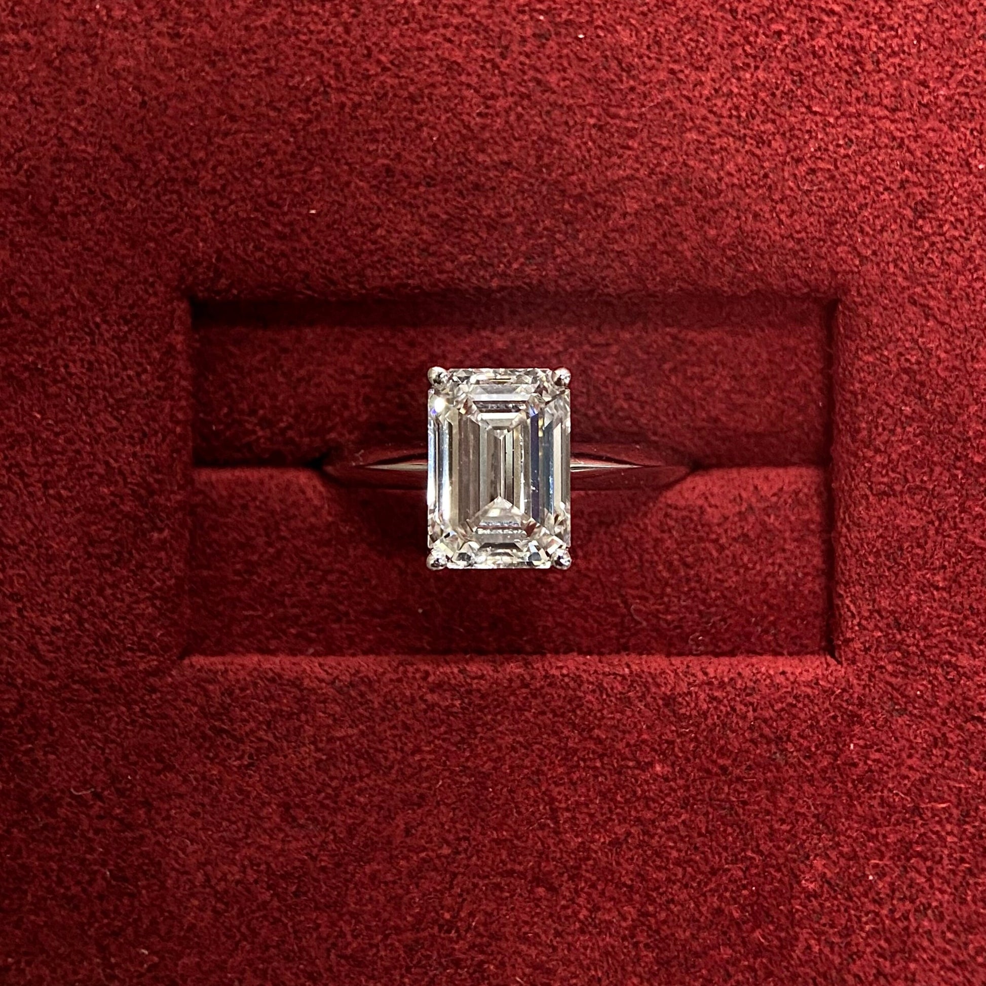 Emerald cut CVD diamond solitaire engagement ring
