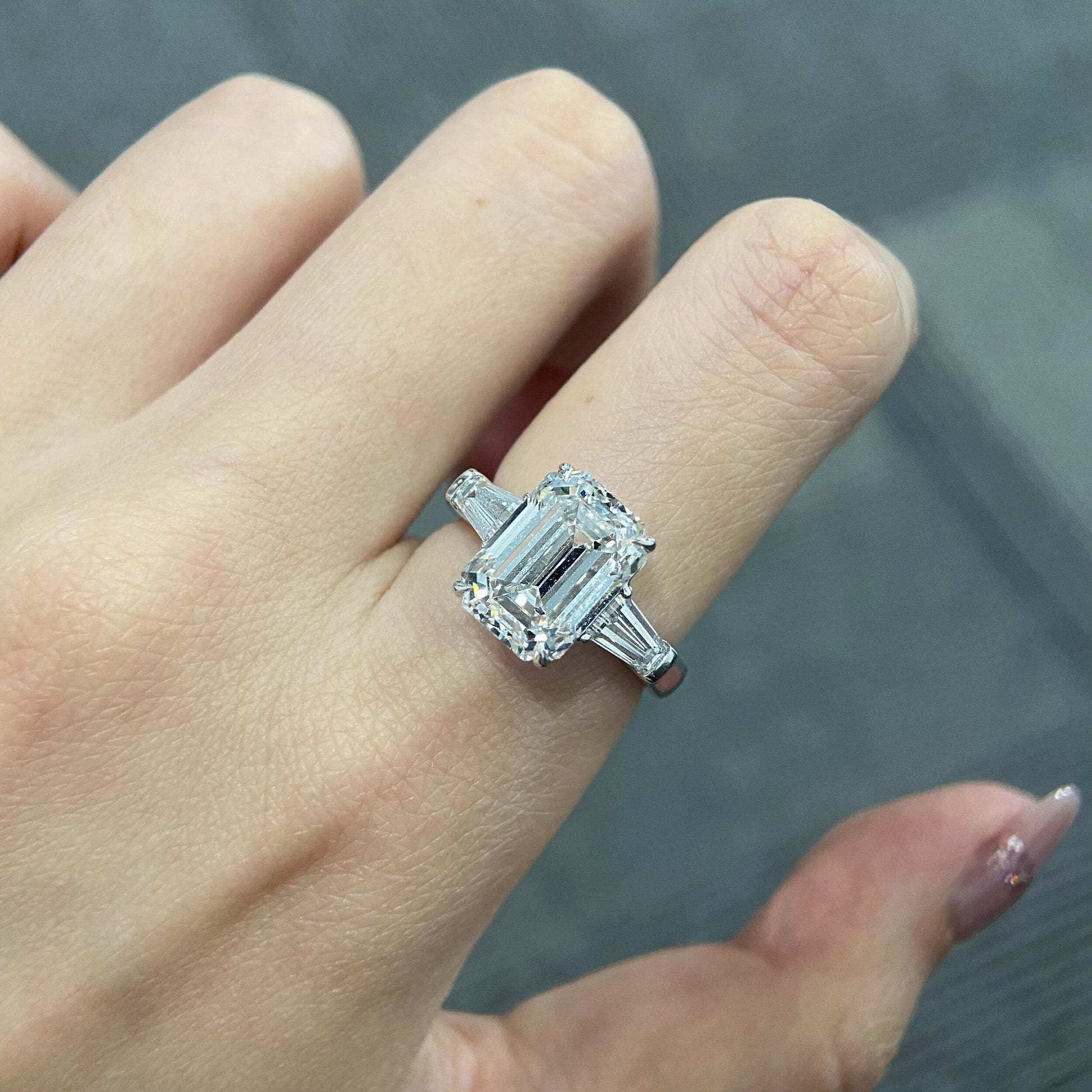 Emerald cut CVD diamond three stone setting engagement ring