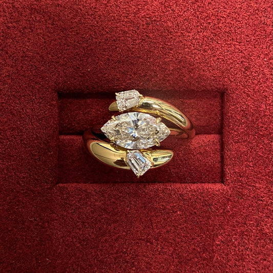 Marquise cut CVD diamond engagement ring in unique setting