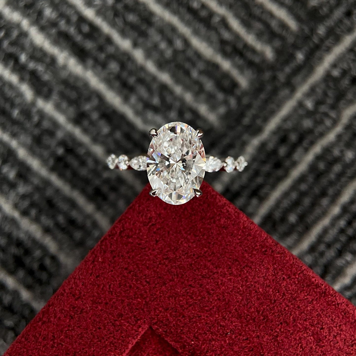 Oval CVD diamond engagement ring in dainty setting