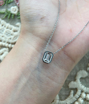 Halo Necklace with 1.0 TCW Emerald Cut Moissanite