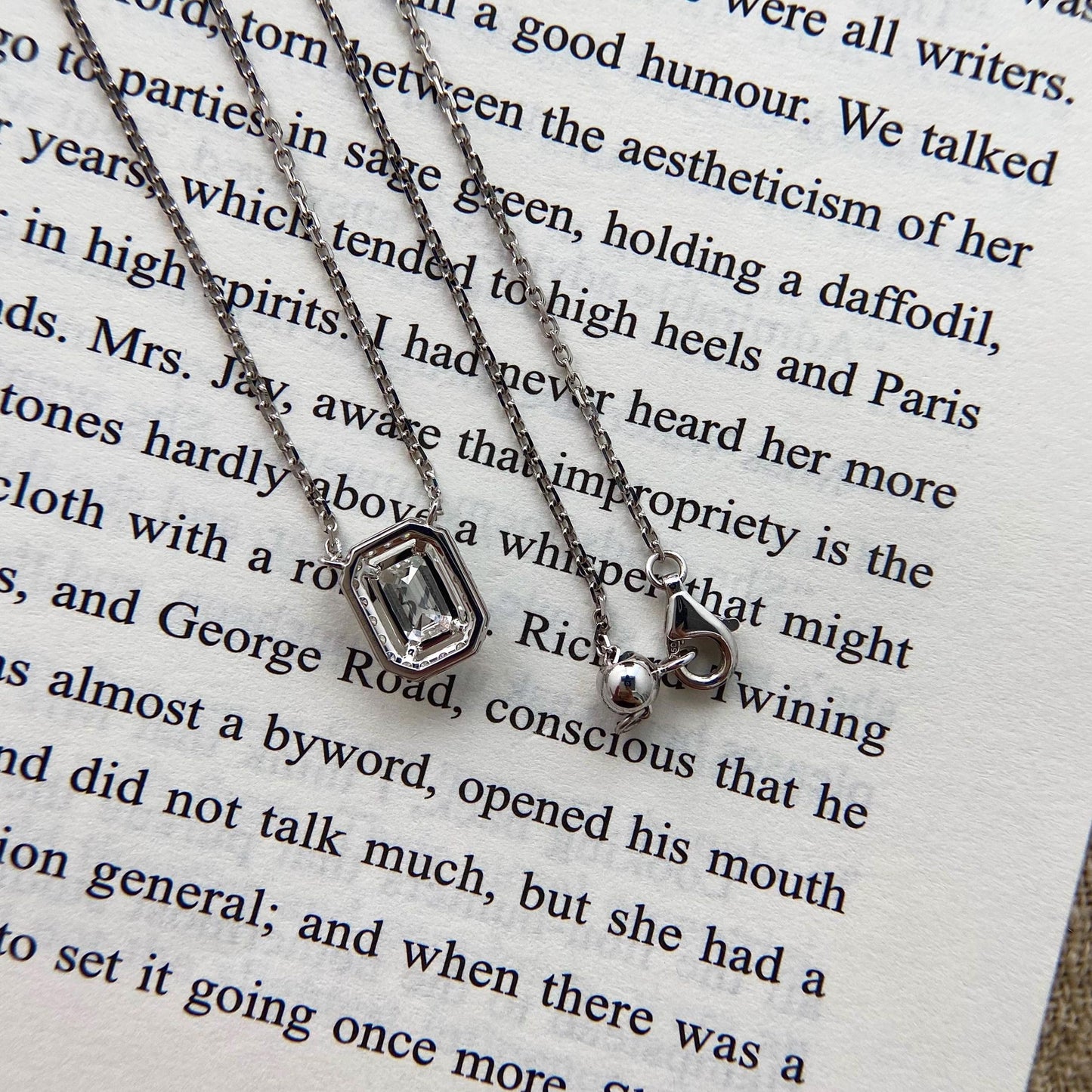 Halo Necklace with 1.0 TCW Emerald Cut Moissanite