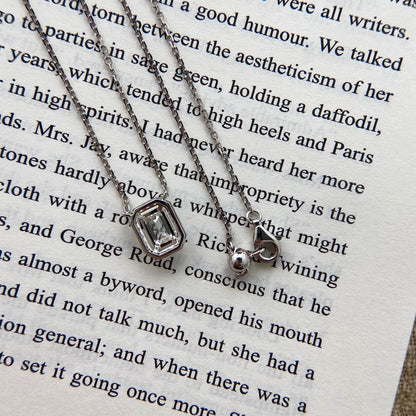 Halo Necklace with 1.0 TCW Emerald Cut Moissanite