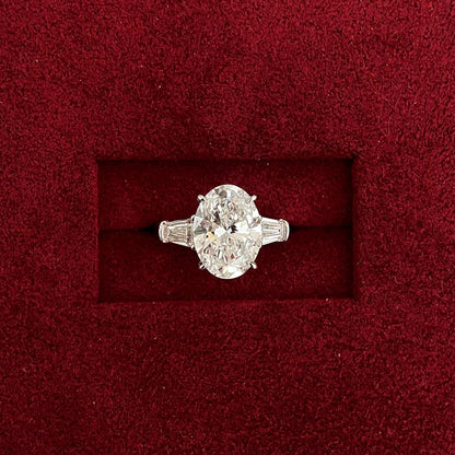 Oval cut CVD diamond three stone engagement ring