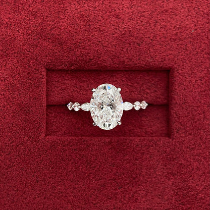 Oval CVD diamond engagement ring in dainty setting