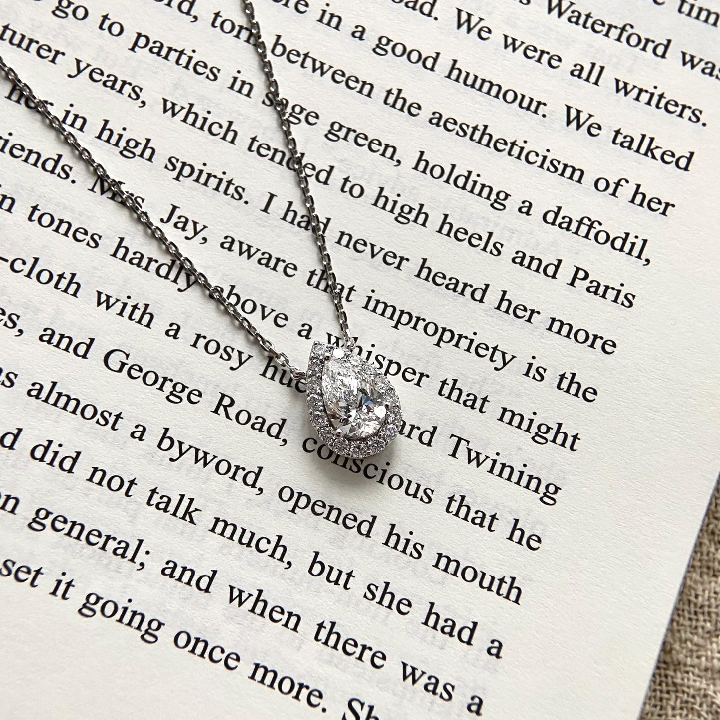 Halo Necklace with 1.0 TCW Pear Cut Moissanite