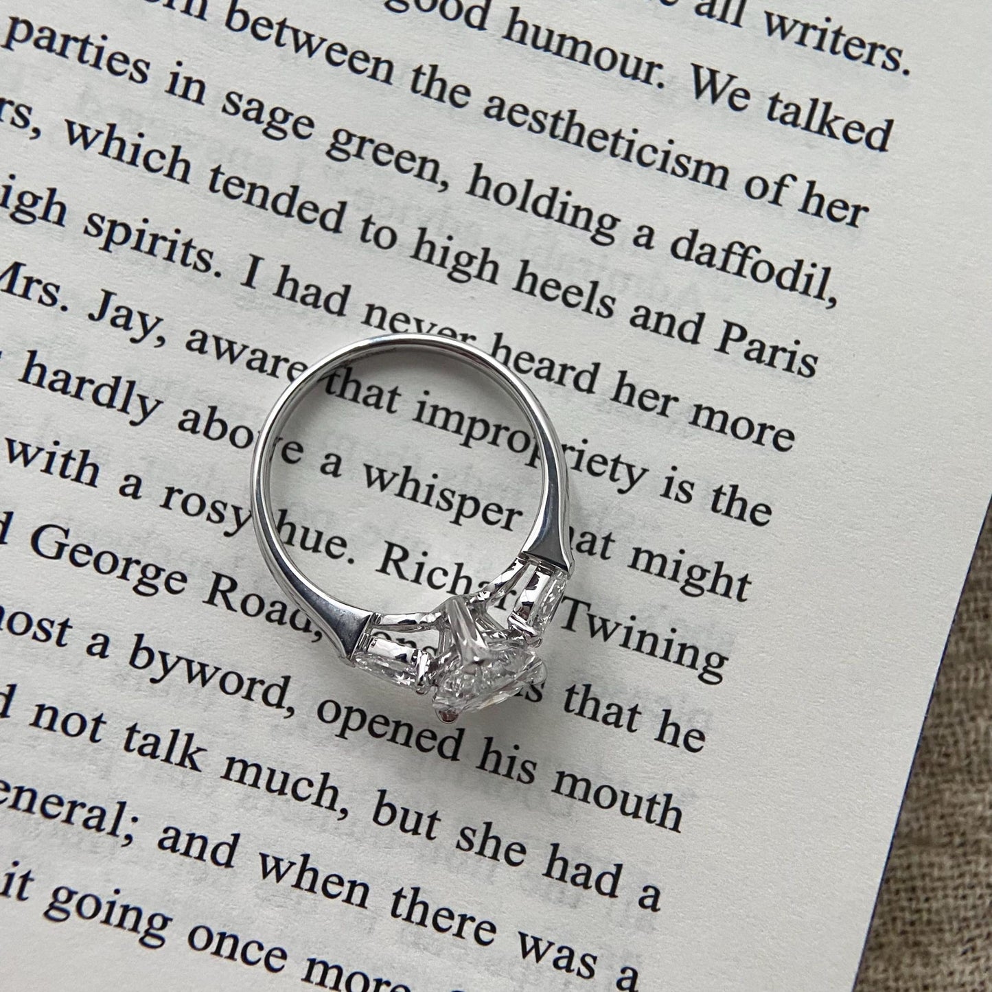 Pear cut CVD diamond three stone style engagement ring