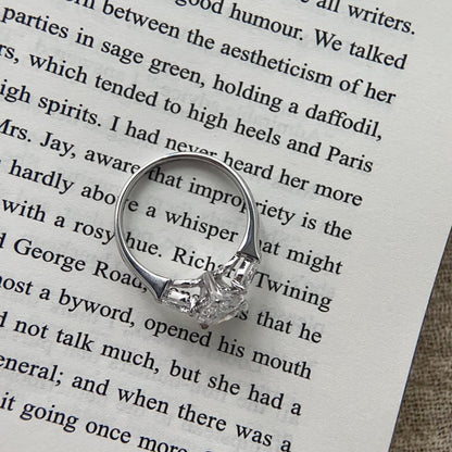 Pear cut CVD diamond three stone style engagement ring