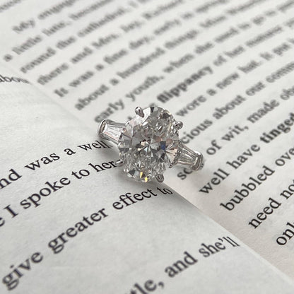 Oval cut CVD diamond three stone engagement ring