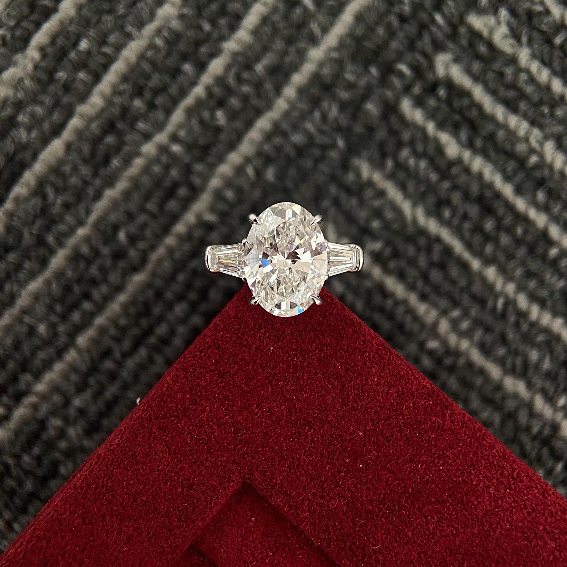 Oval cut CVD diamond three stone engagement ring